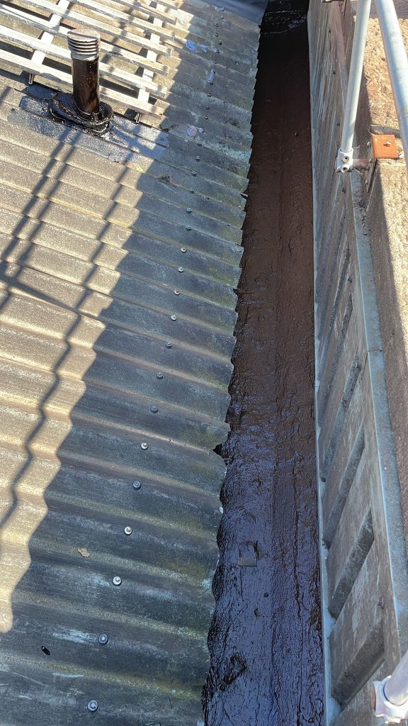 HBS200 gutter lining application — commercial box gutter refurbishment