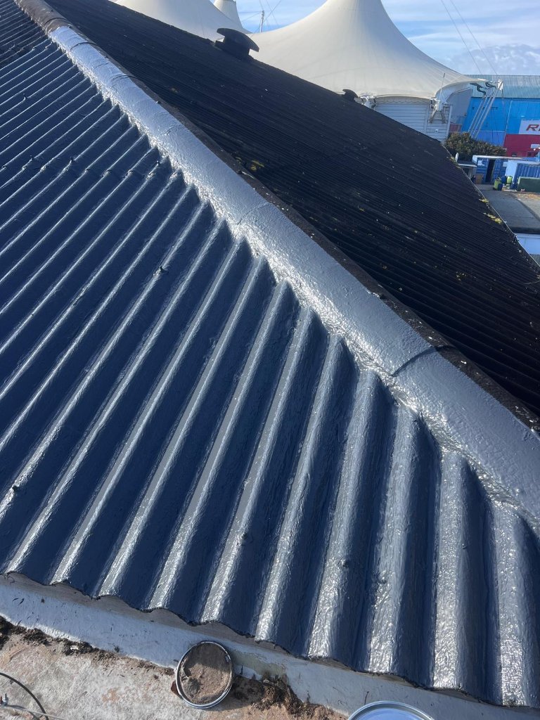 Detail sealing on metal roof with visible repair area