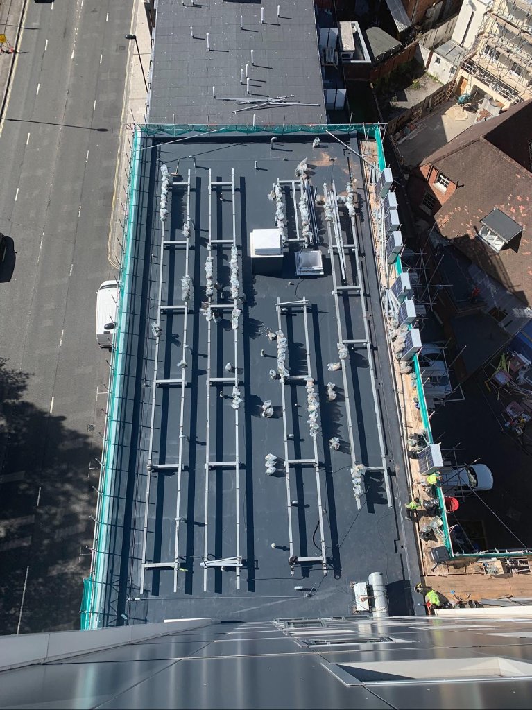 Rocathaan HotSpray aerial commercial roof — industrial waterproofing by Forti Nova