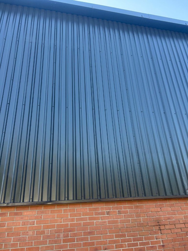 TopSpray35 cladding elevation — completed industrial building refurbishment