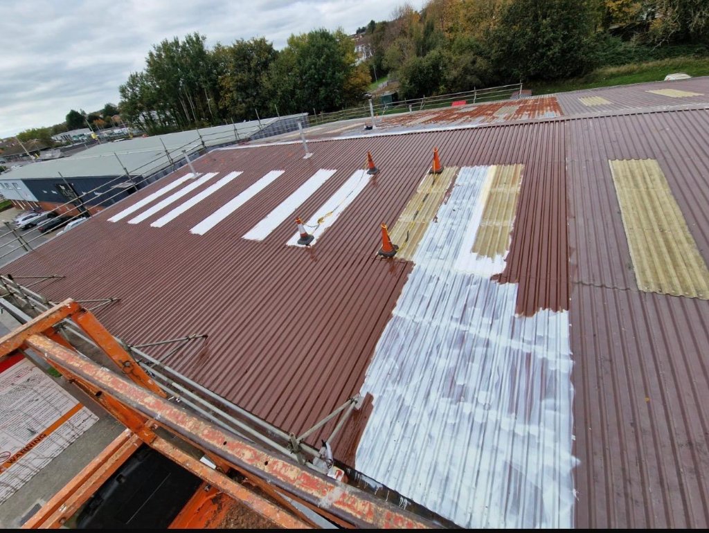 Continuous spray application across commercial roof area