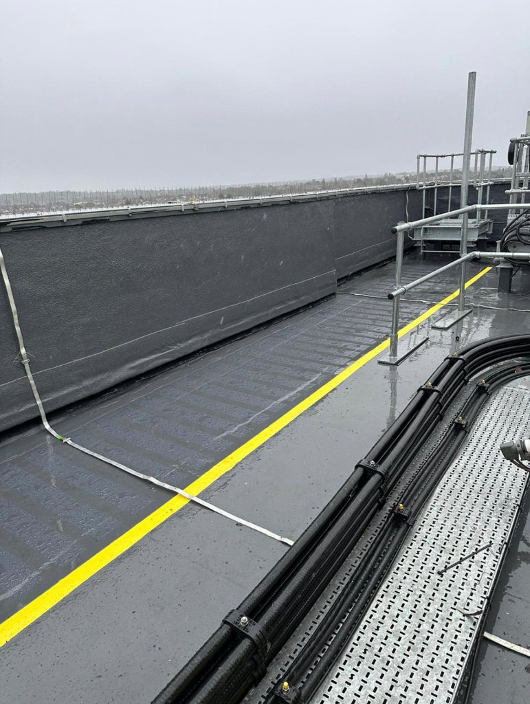 ProFast Flooring industrial roof deck with safety line marking