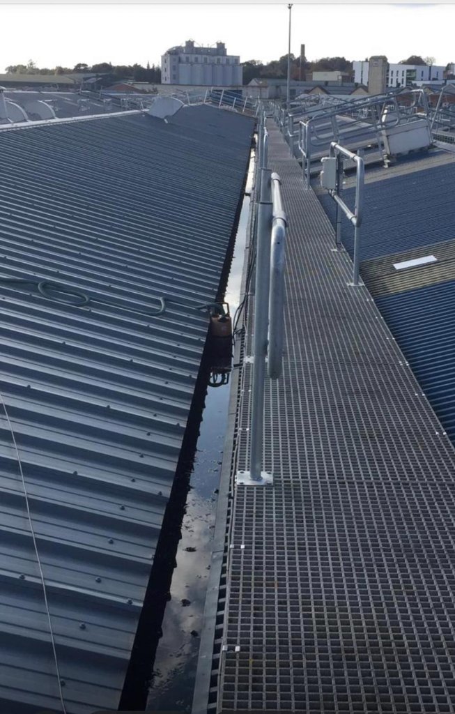 Protective coating application process on metal roof substrate