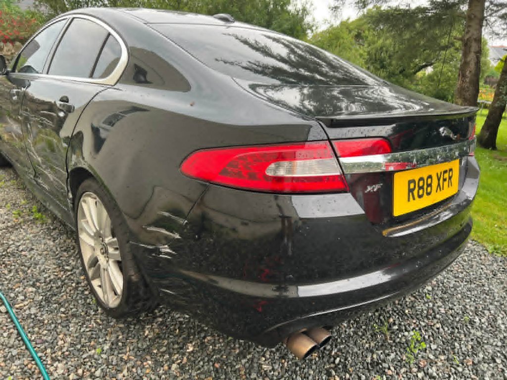 Jaguar XF rear quarter panel accident damage before bodywork repair — M&M Vehicle Repairs Tewkesbury