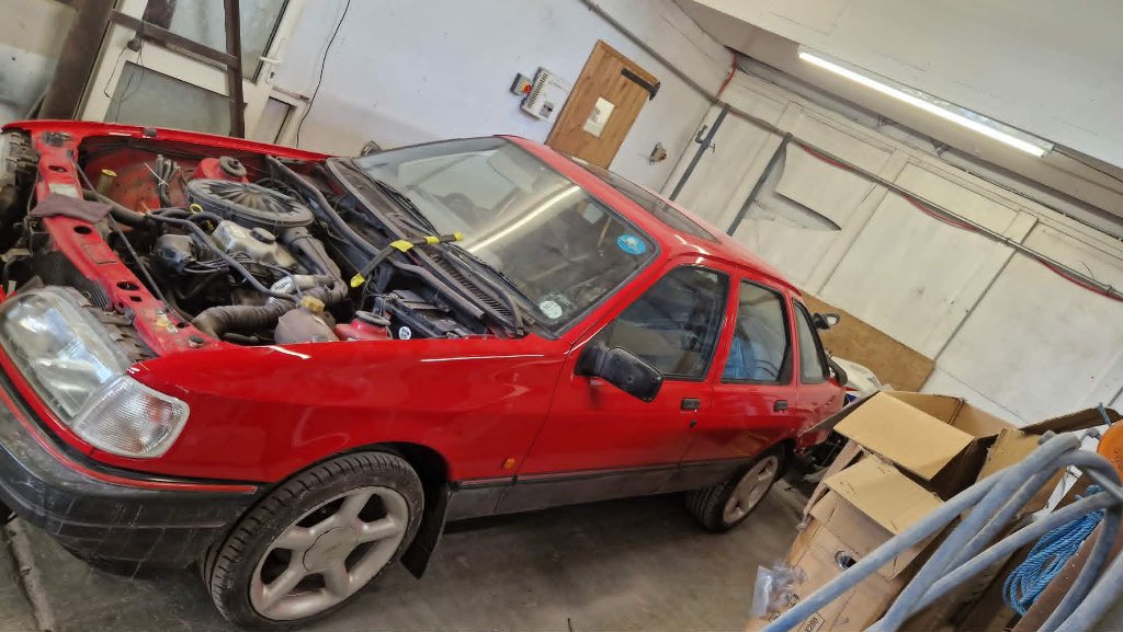 Red Ford Sierra bonnet open for engine inspection and mechanical service — M&M Vehicle Repairs Tewkesbury