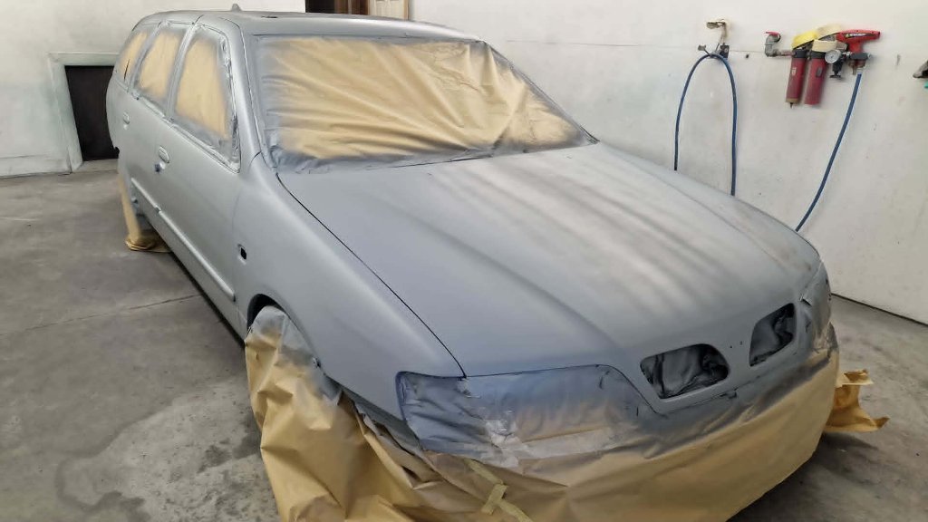 Large estate rear primer and masking — Tewkesbury bodyshop