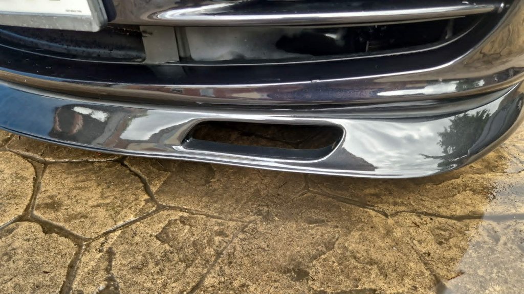 Front bumper dent and impact damage close-up — M&M Vehicle Repairs Tewkesbury