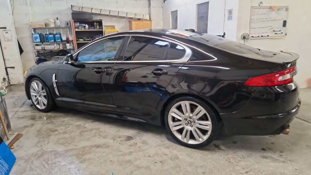 Jaguar XF completed bodywork repair to showroom finish in workshop — M&M Vehicle Repairs Tewkesbury