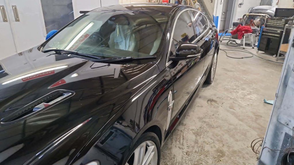 Vehicle raised on ramp for full suspension component inspection — M&M Vehicle Repairs Tewkesbury