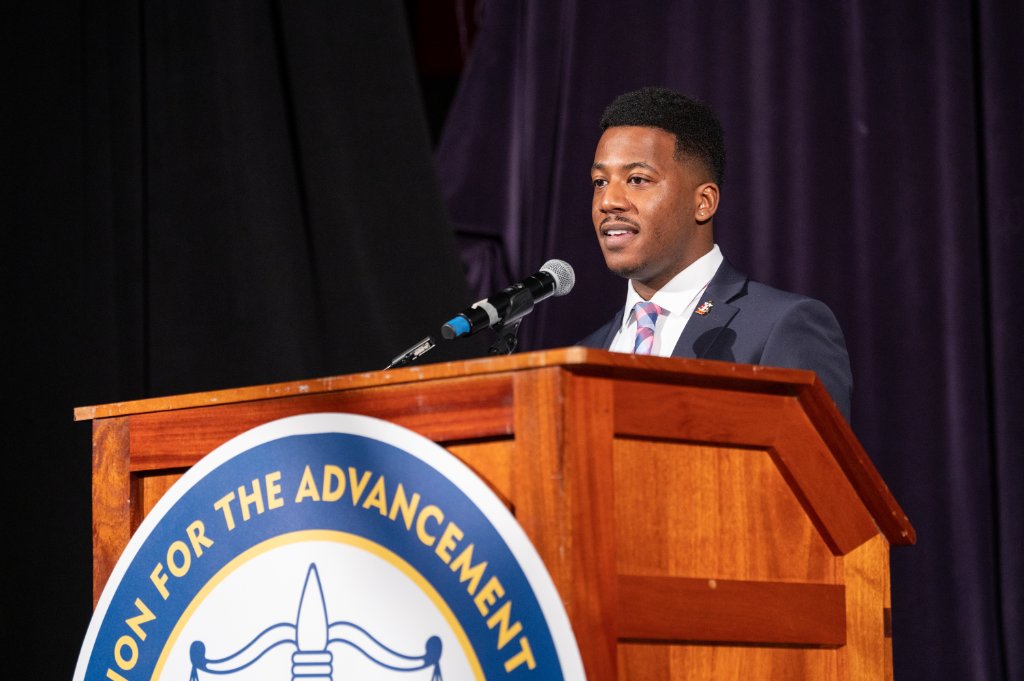 Speaking at the NAACP podium