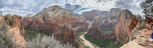 Wide panoramic view of Angels Landing and Zion Canyon from above