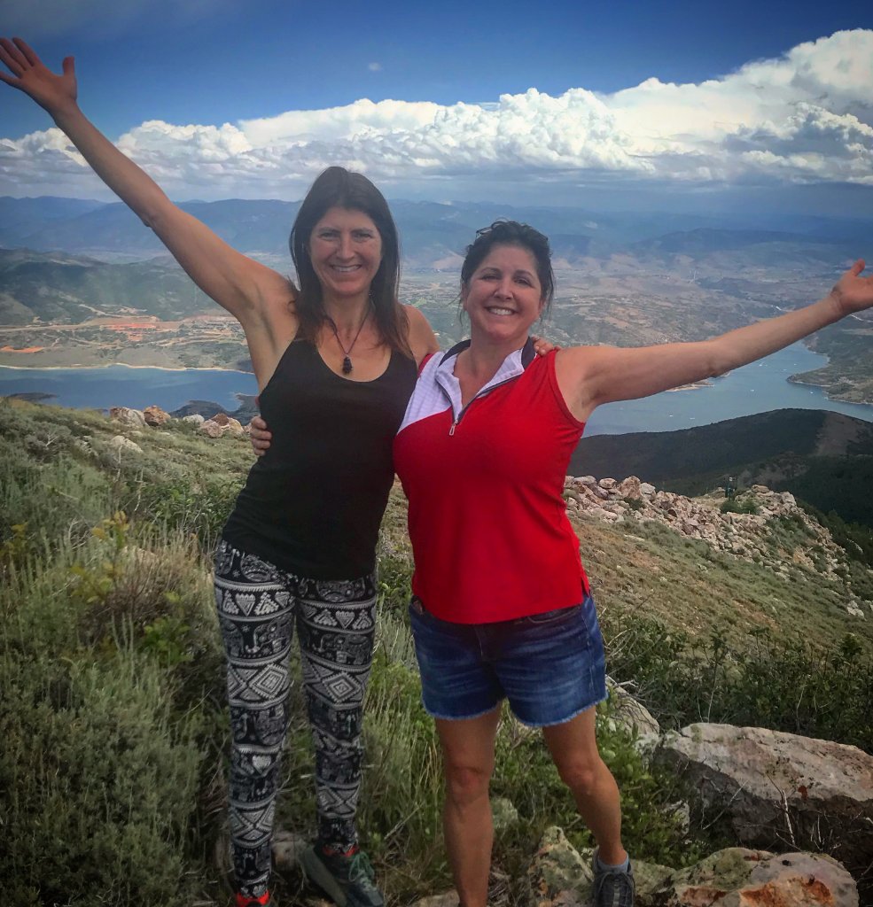 Winslow and Heather on a mountain summit