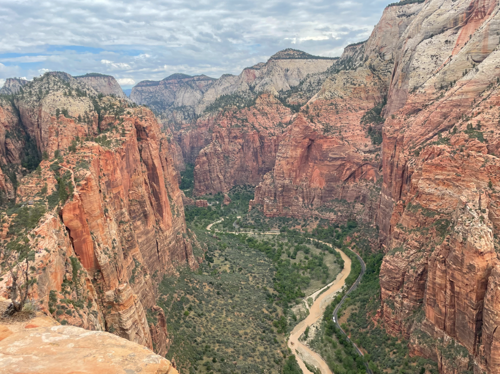 Panoramic view from Angels Landing looking down into Zion Canyon with winding river below