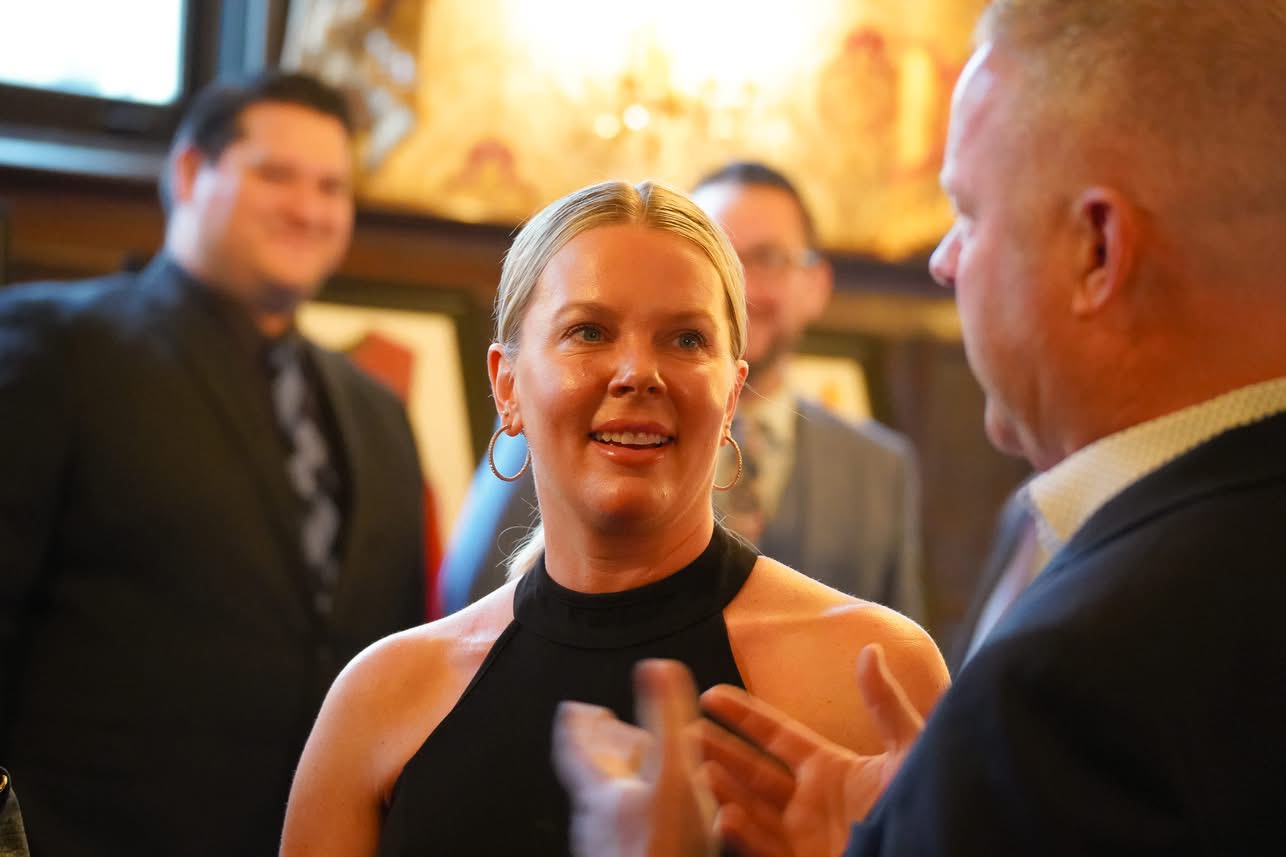 Woman smiling at the gala