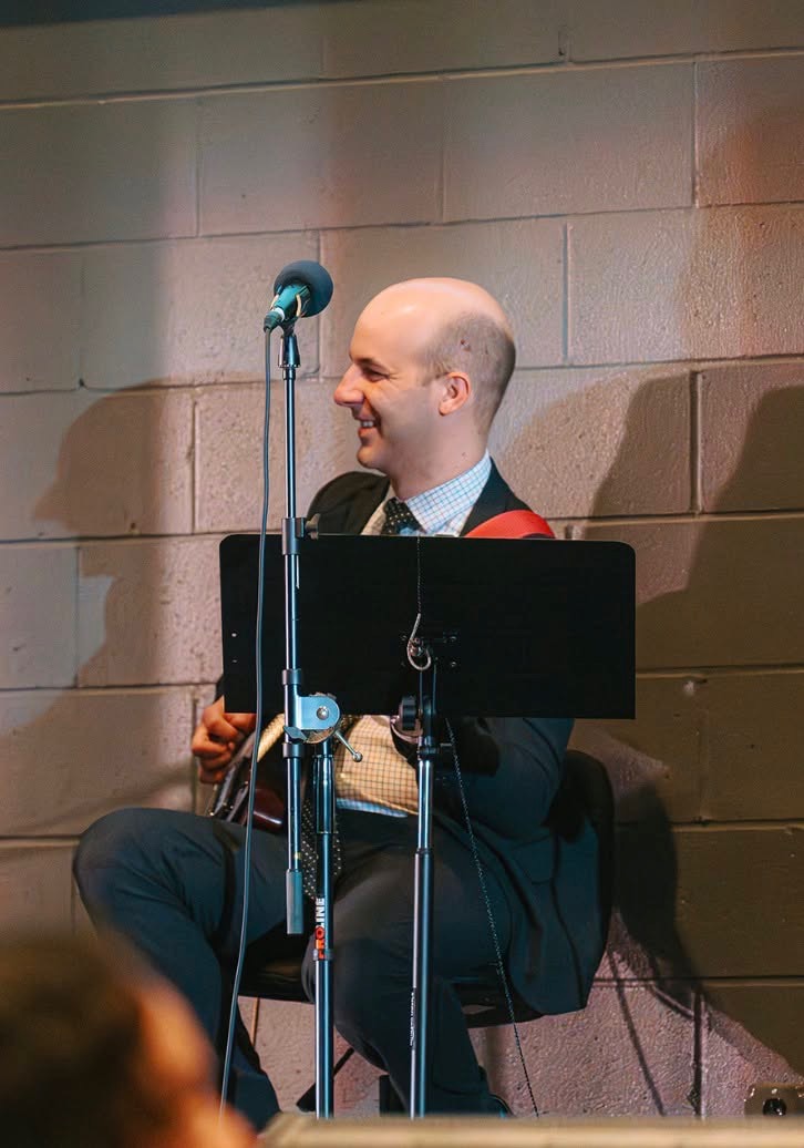 Man playing acoustic guitar