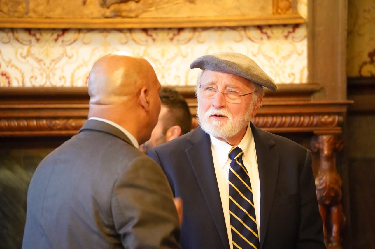 Two attendees in conversation