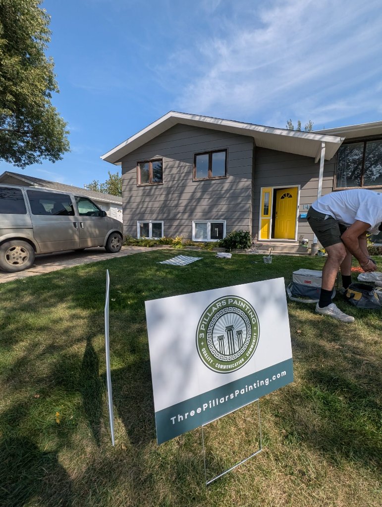 3 Pillars Painting at work on a Saskatoon home