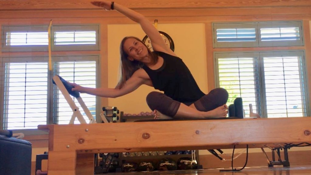 Keri on pilates reformer