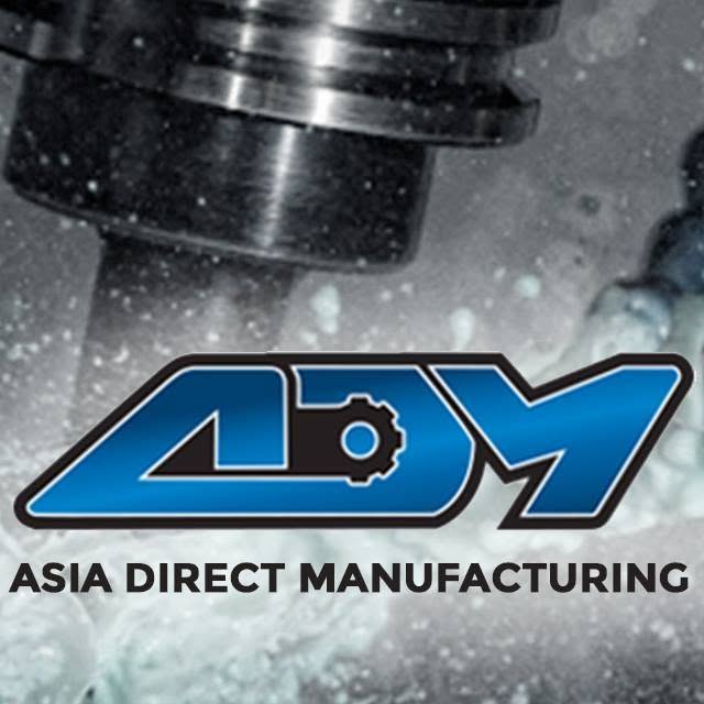 Precision machined aluminum component on black glass surface