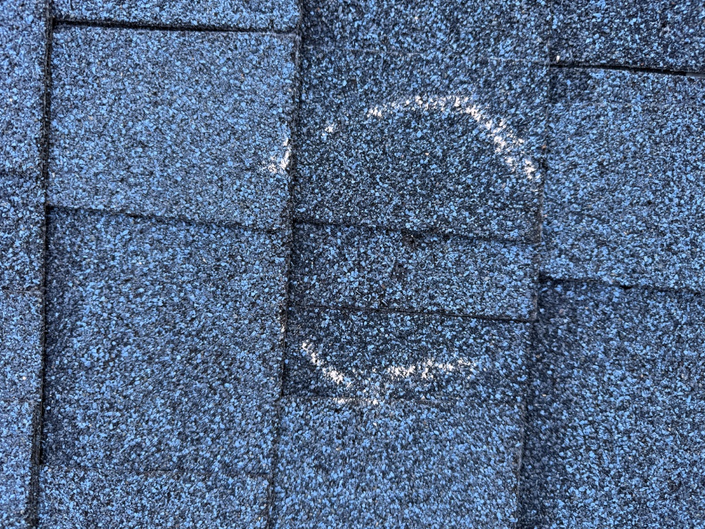 Rusted gutter damage close-up