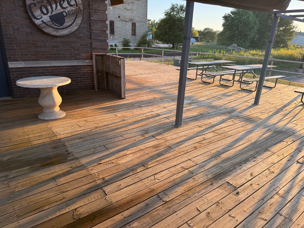 Weathered deck boards before restoration