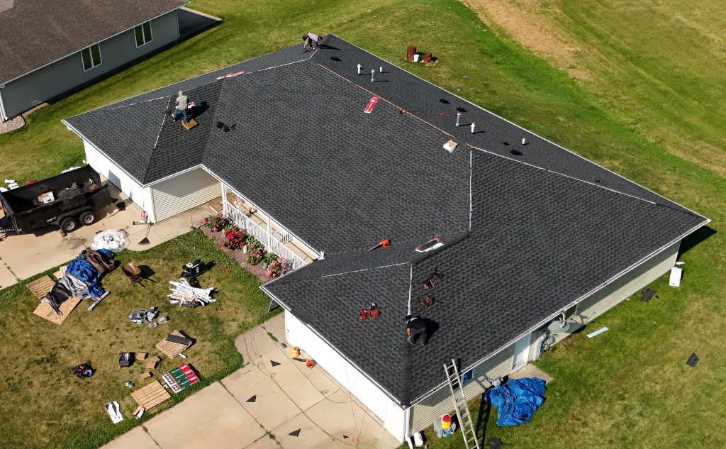 After — new black shingles installed