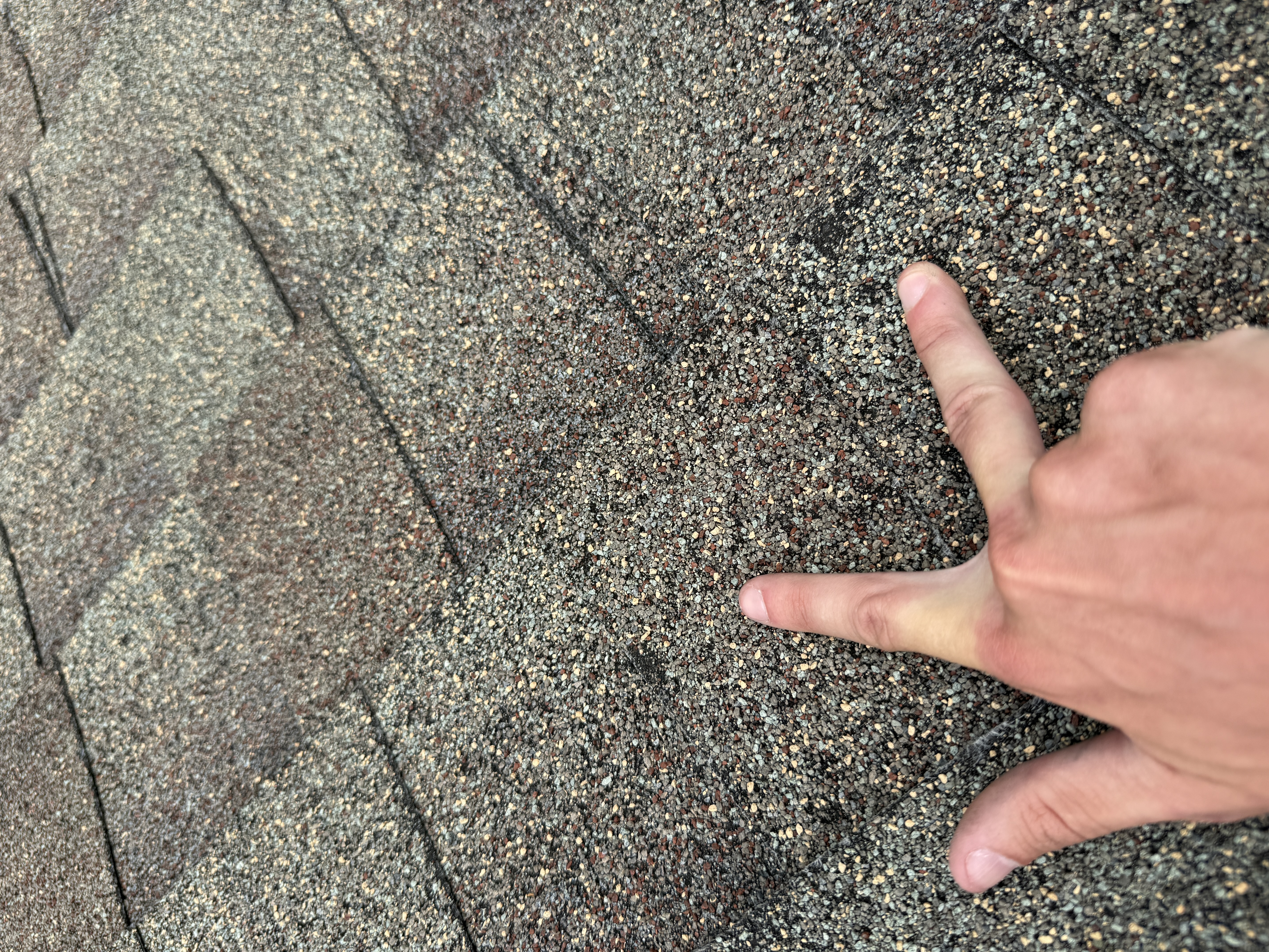 Pointing at localized shingle granule loss