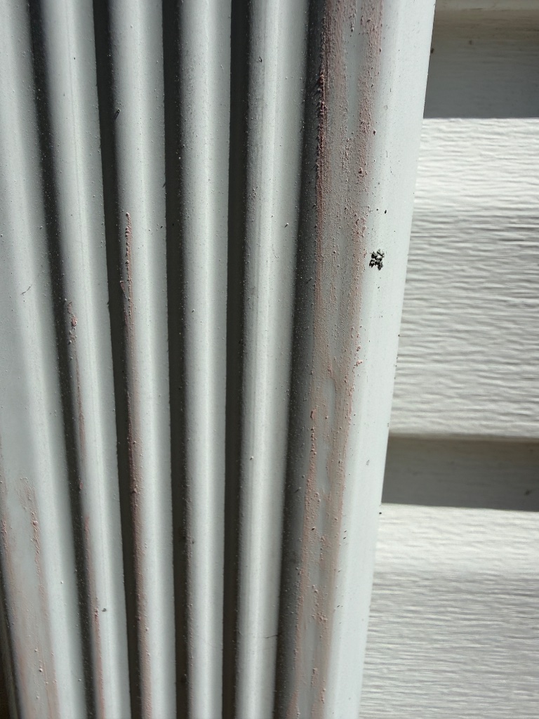 Hail damage on metal soffit and siding