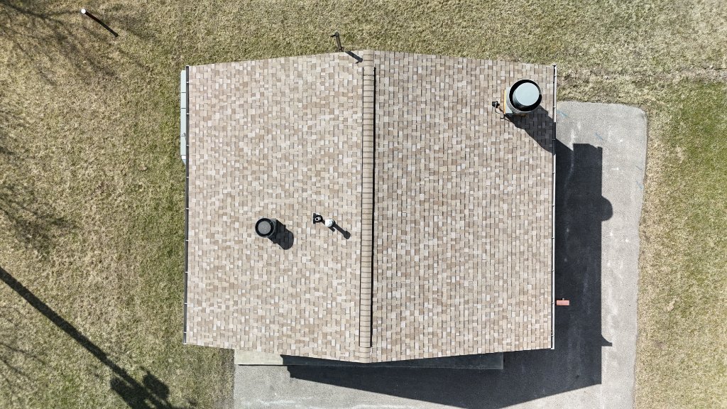 Drone aerial — shingle detail and ridge cap