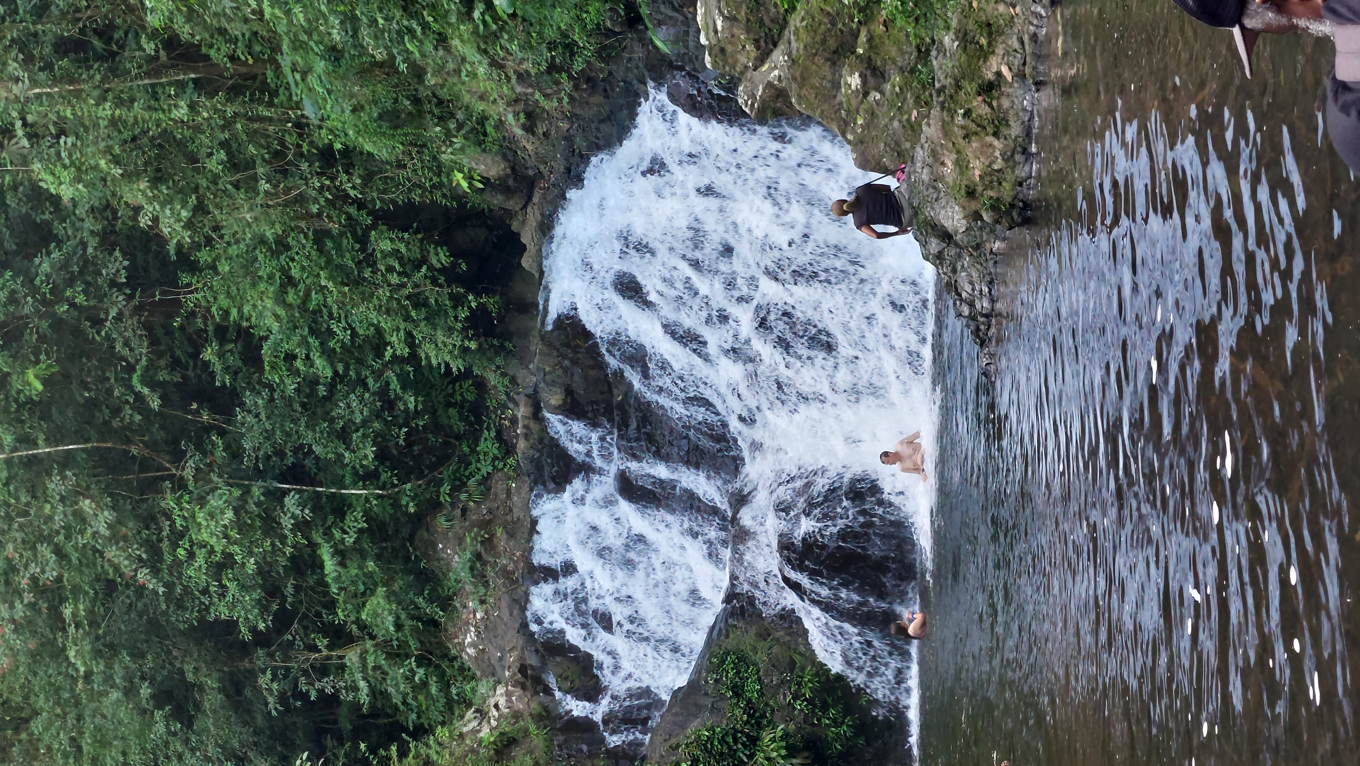 Refreshing waterfall swim