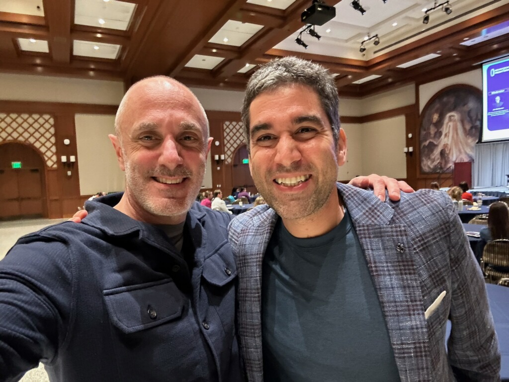 Dr. Nigel Newbutt with Aras Sheikhi at the NeuroTech Frontiers Summit 2026