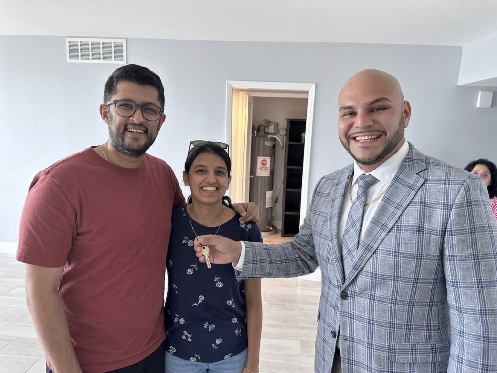 Jacob Edri with happy client 9
