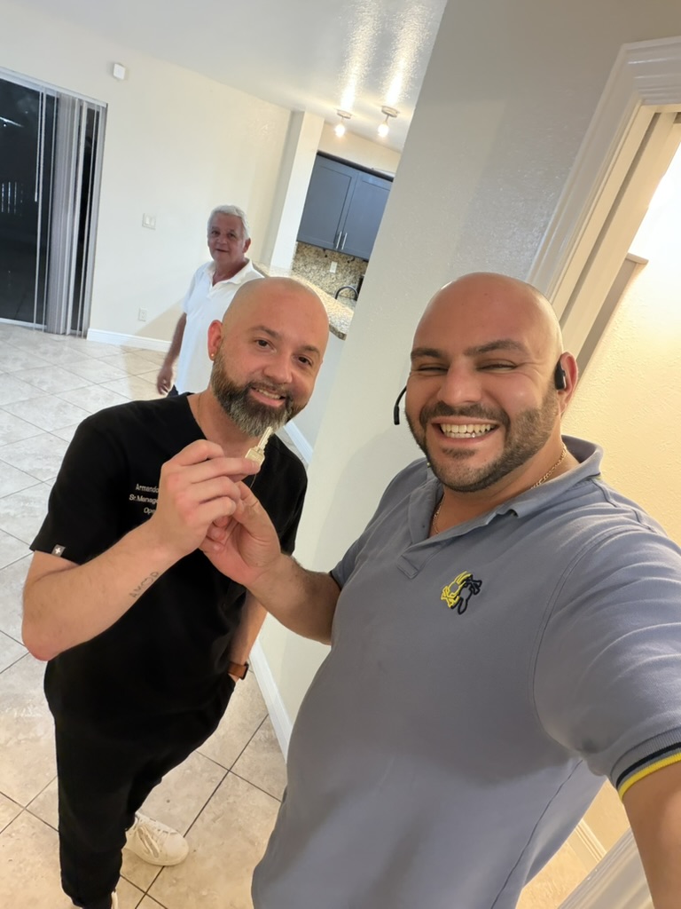 Jacob Edri with happy client 3