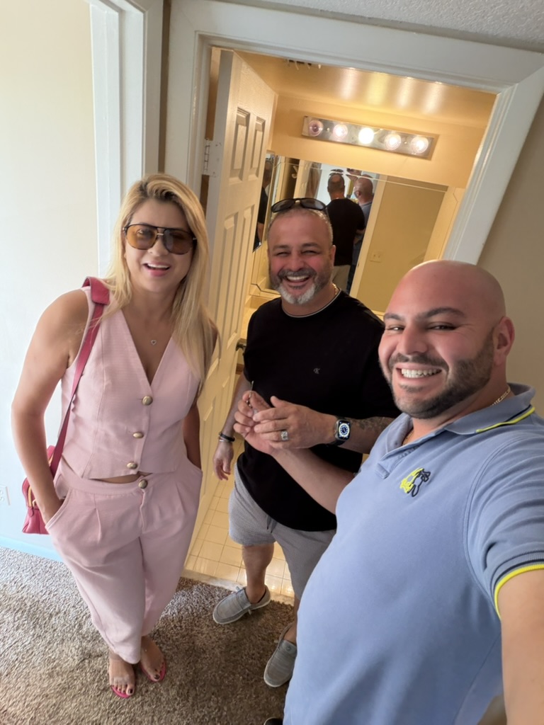 Jacob Edri with happy client 1
