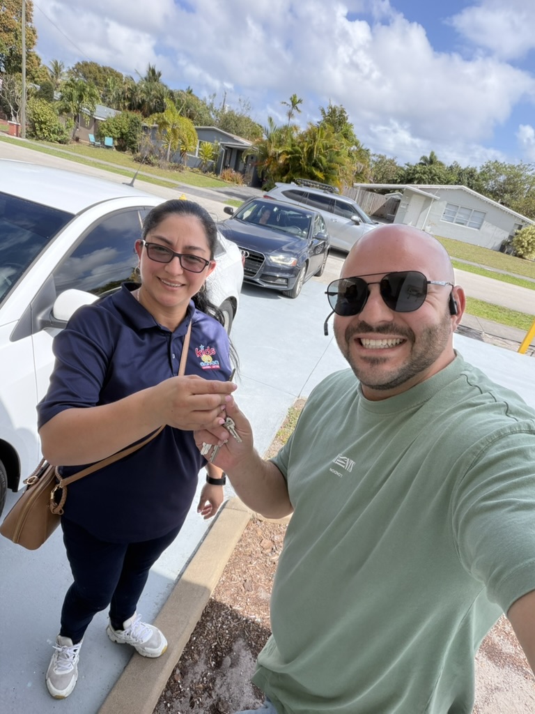 Jacob Edri with happy client 2