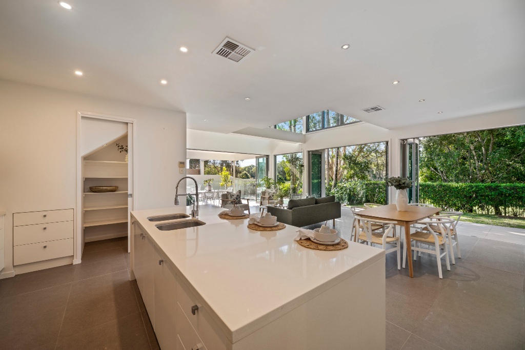 Resort residence — kitchen island with indoor-outdoor flow