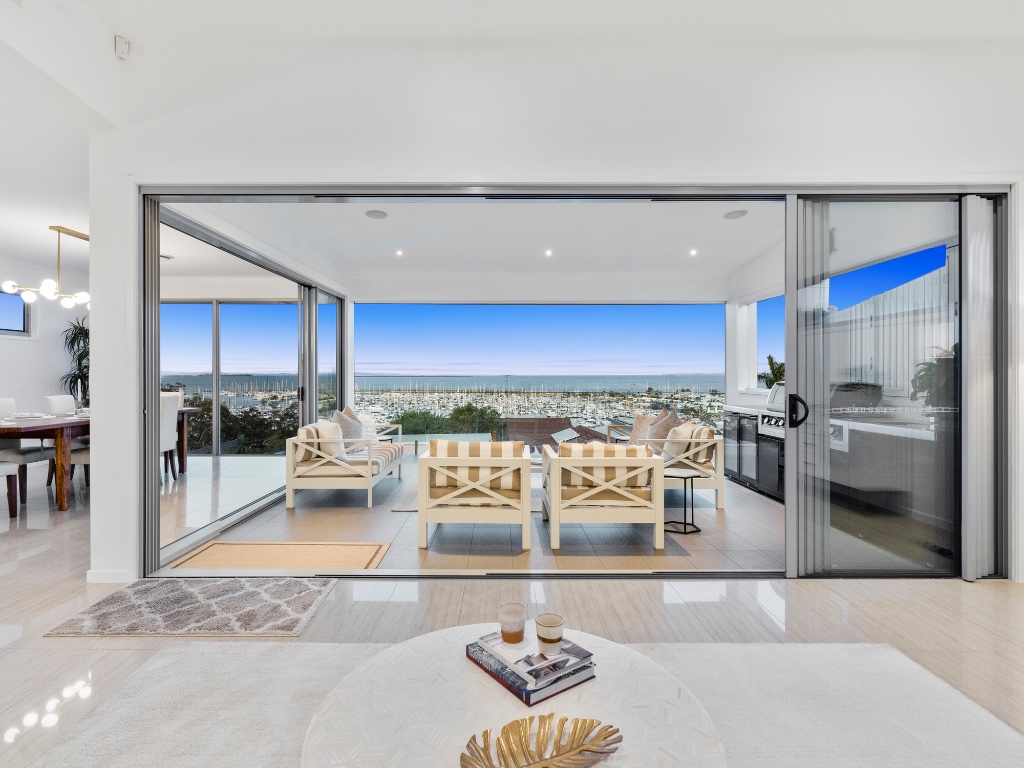 Oceana Terrace — open plan living with wall-to-wall sliding doors to terrace