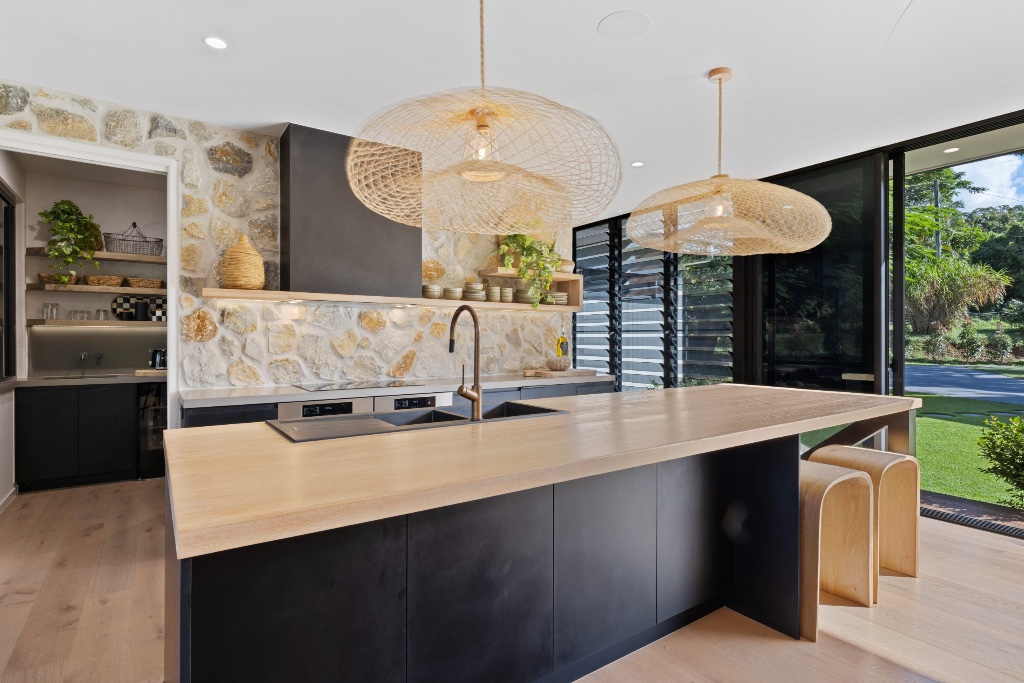 Tinbeerwah Road — living room with stone fireplace