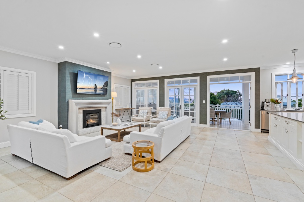 Stratton Terrace — open plan living with fireplace and ocean views
