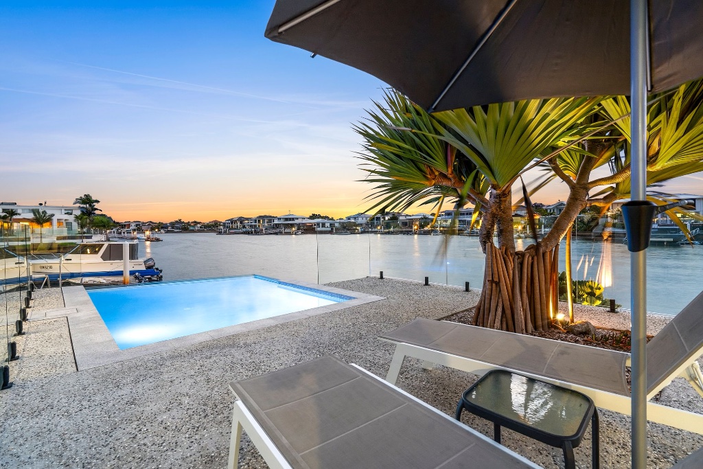 Waterfront estate — pontoon walkway at dusk