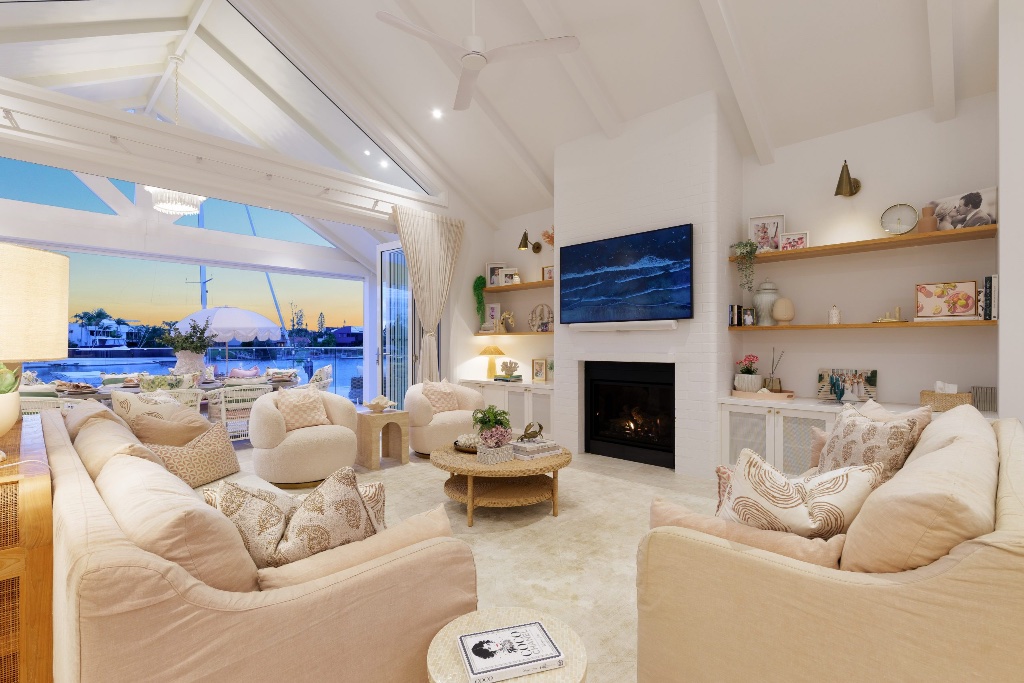 Seahaven Court — open plan living with fireplace and marina views