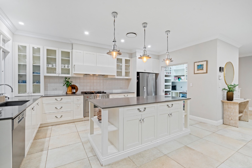 Stratton Terrace — gourmet white kitchen with island