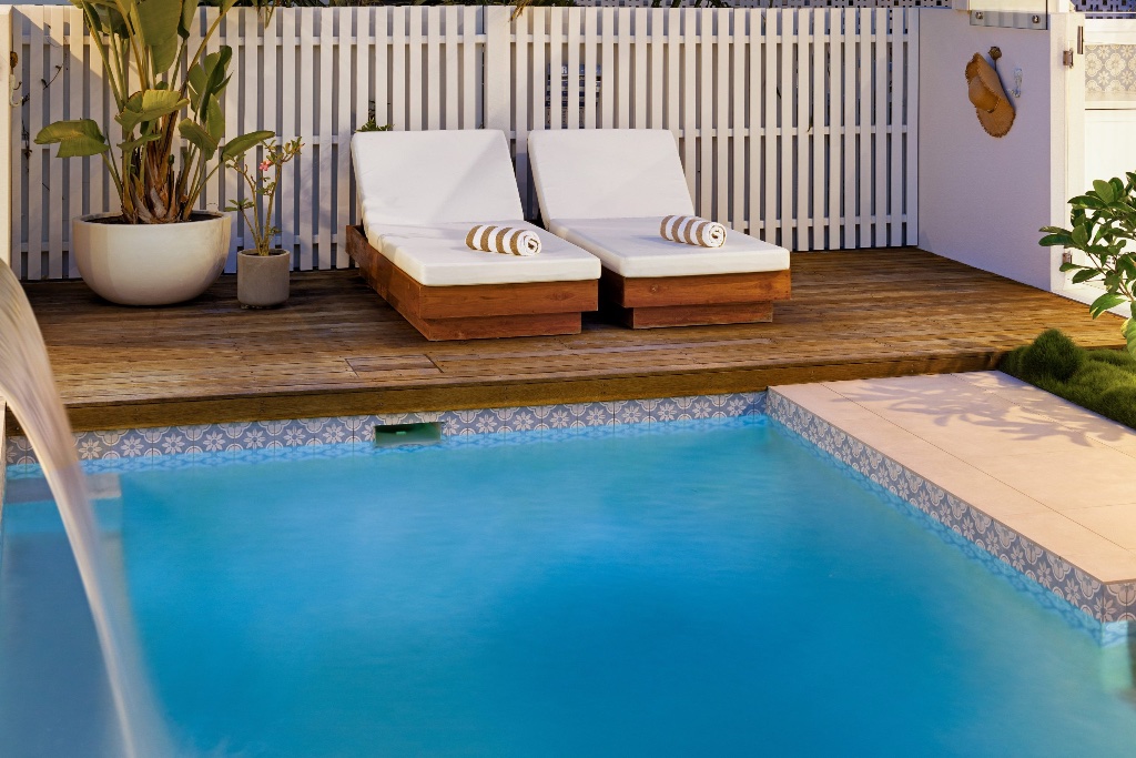 Coolibah Street — pool with timber deck and sun loungers