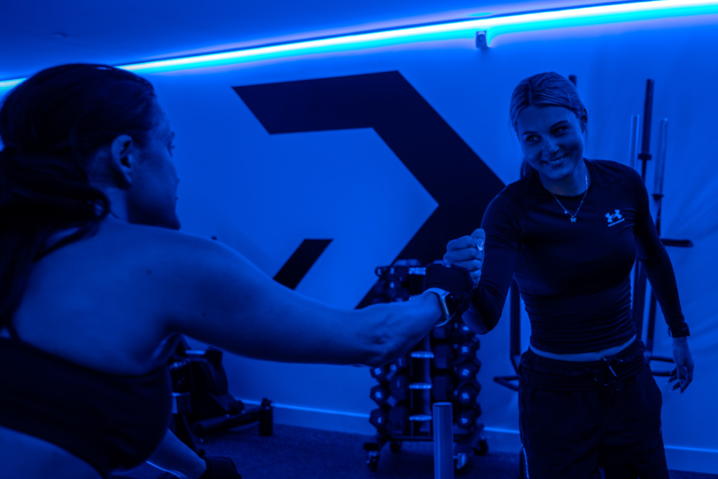 Altitude Nation coach fist bump