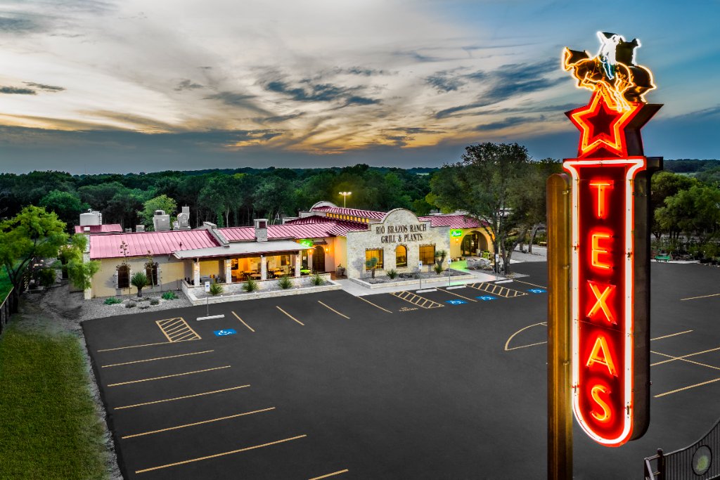 The dining room at Rio Brazos Grill during blue hour