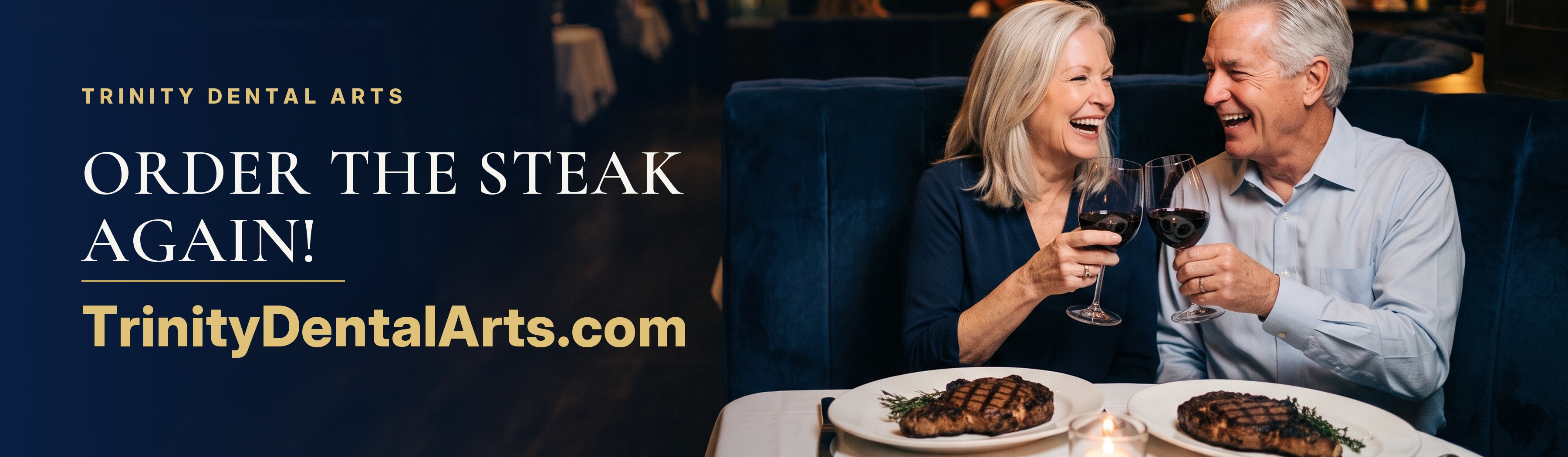 Couple toasting with wine over steak dinners at a restaurant