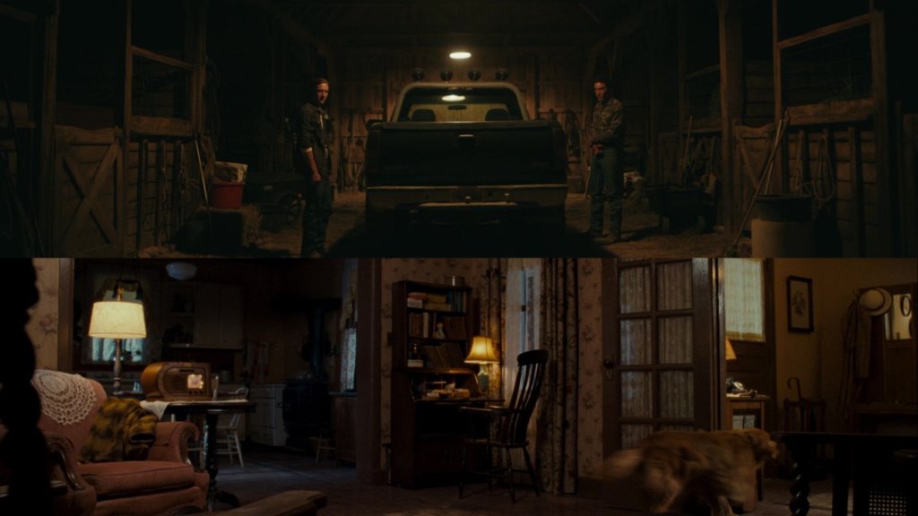 Two men facing off in a barn — confrontation over M