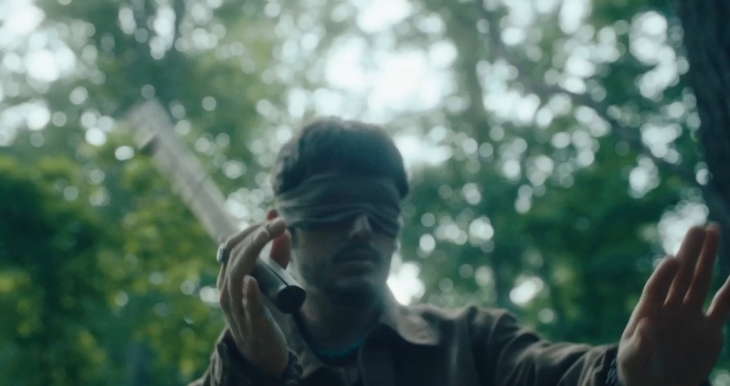Blindfolded in the woods