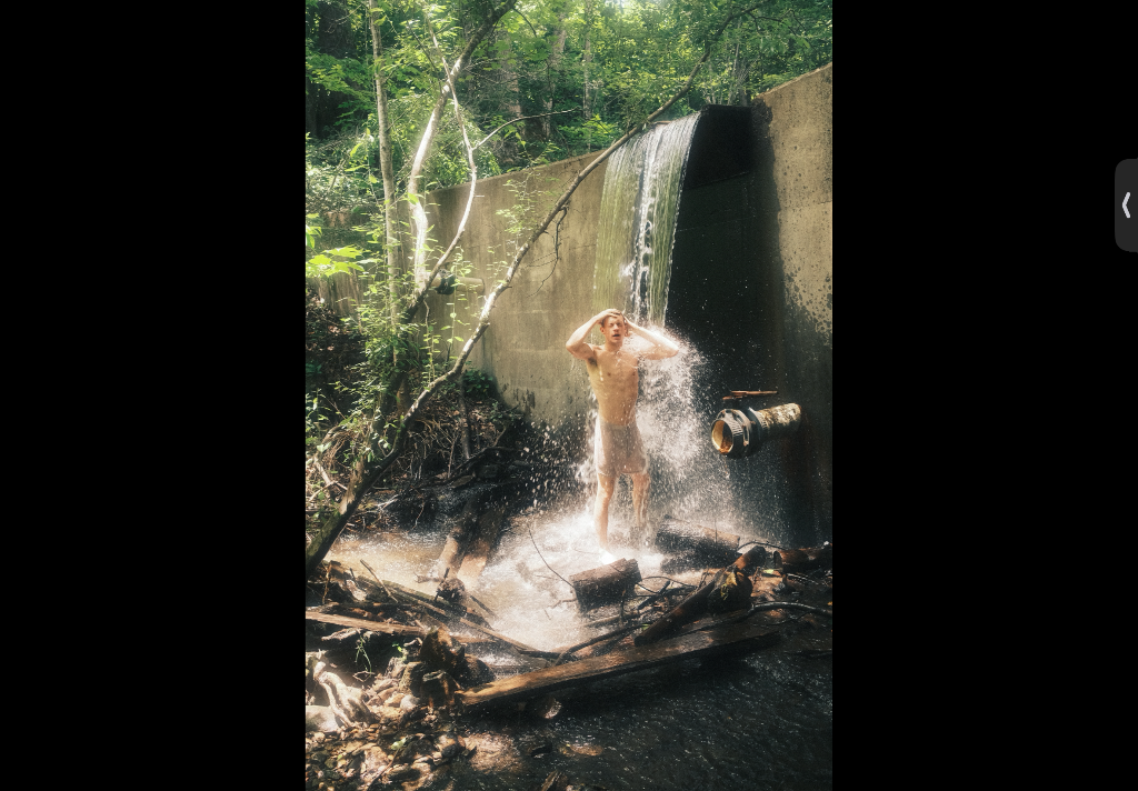 Under the waterfall