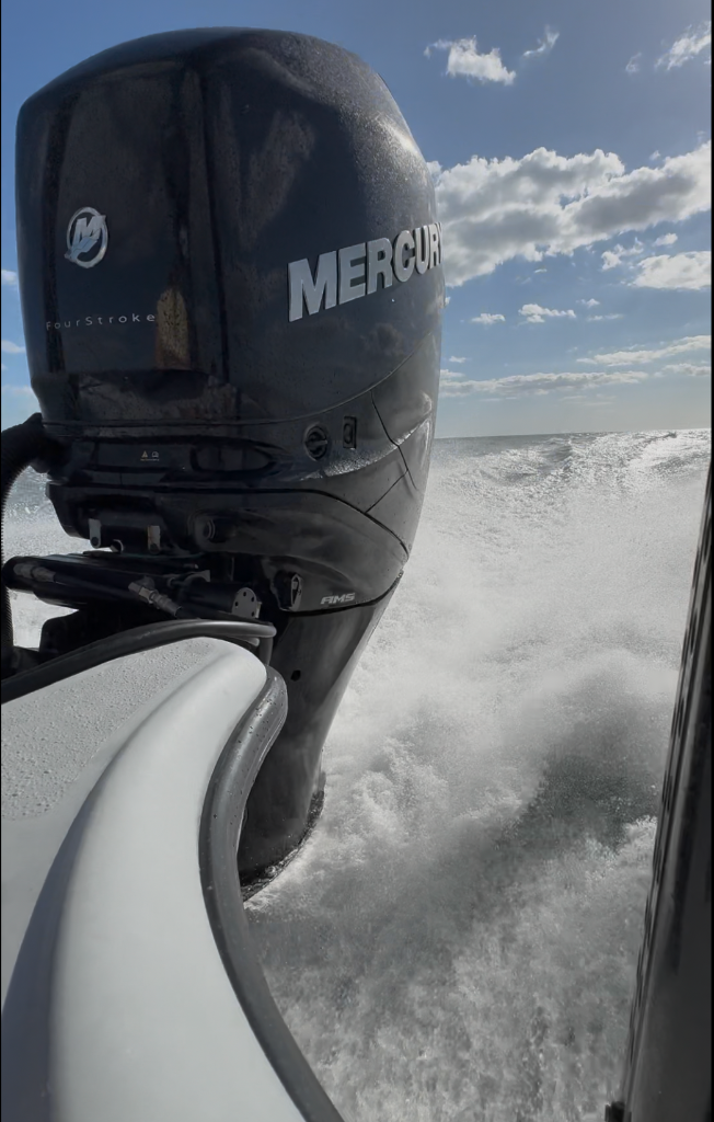 Mercury FourStroke outboard running on water